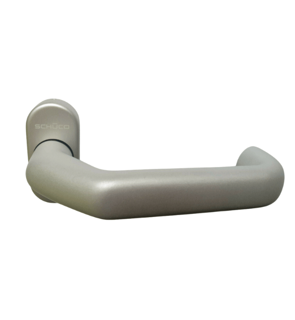 Schüco curved metal door handle in a matte gray finish, featuring a wall-mounted base with a visible Schöco logo.